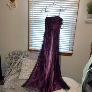 Plum purple prom dress with beaded accents & black mesh
